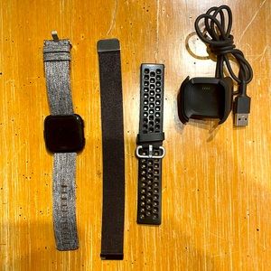 Fitbit Versa with accessories